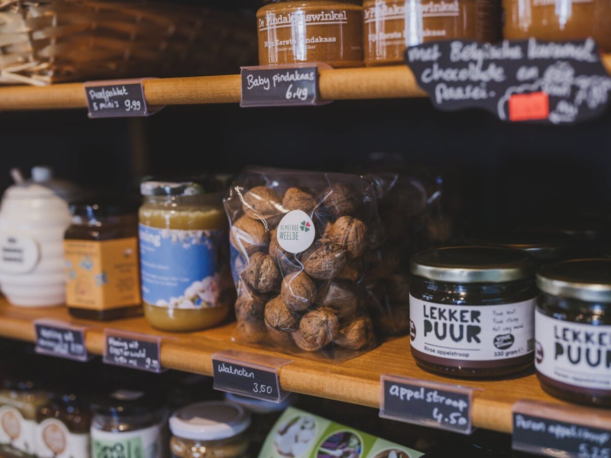 Explore a vibrant Dutch store in Almere featuring local food items like walnuts, honey, and jams.
